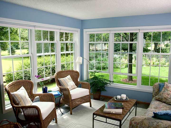 White cottage-style double hung windows