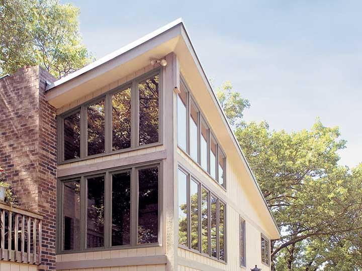 2 stories of terratone picture windows