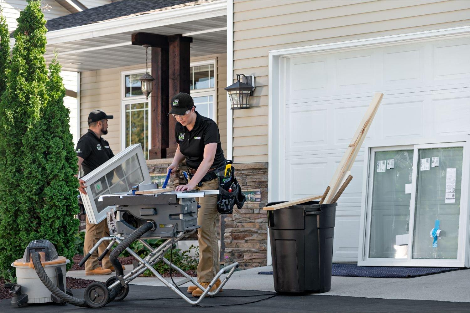 Renewal by Andersen Window replacement expert installers loading in a new window for installation