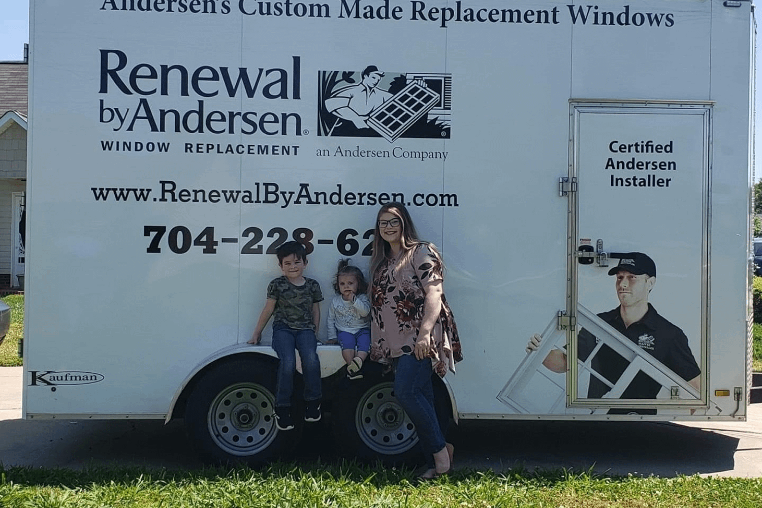 Marilena Villardi and family standing infront of a Renewal by Andersen truck ready to get their windows installed