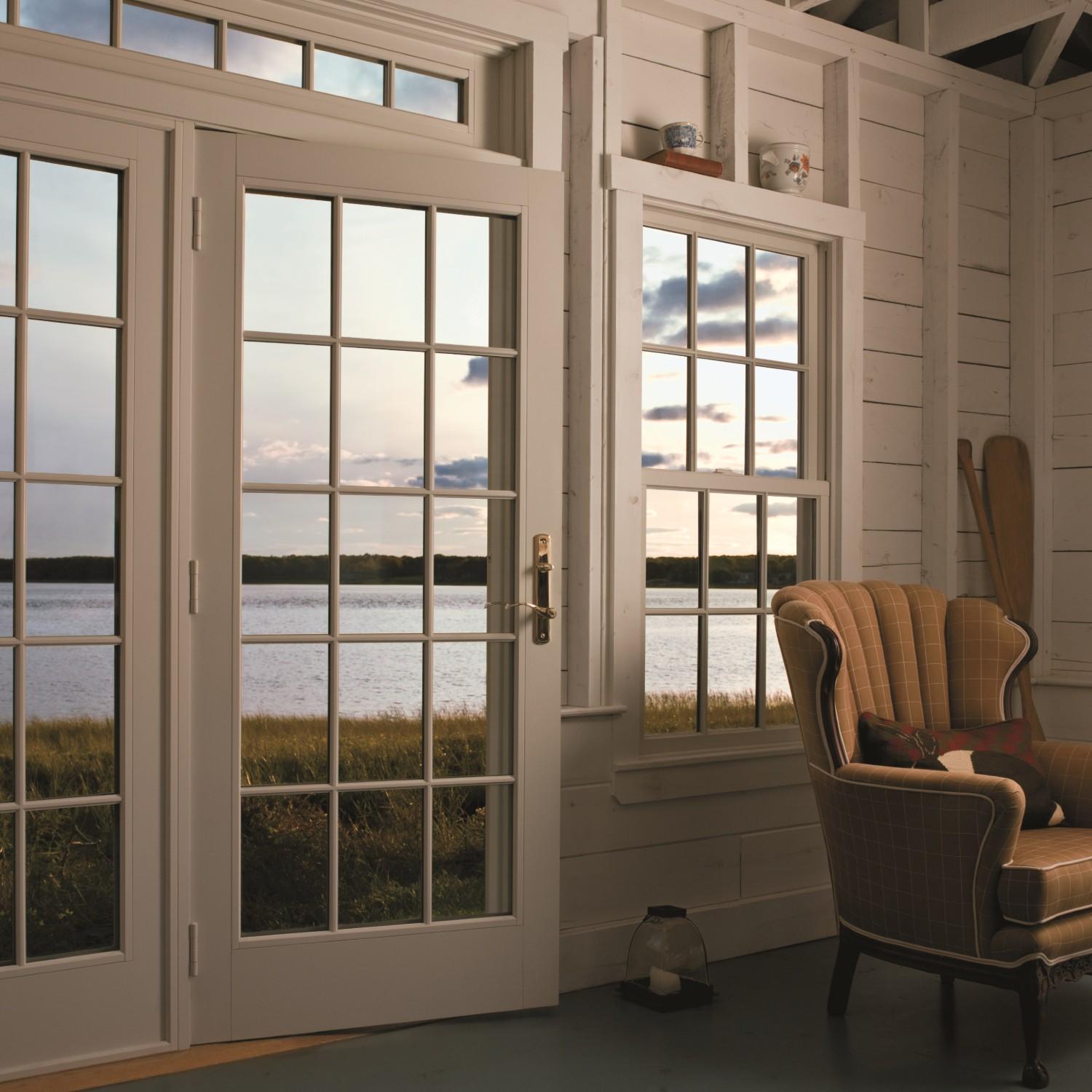 A single operable panel on a set of French doors. This french door has equal divided lite grilles.