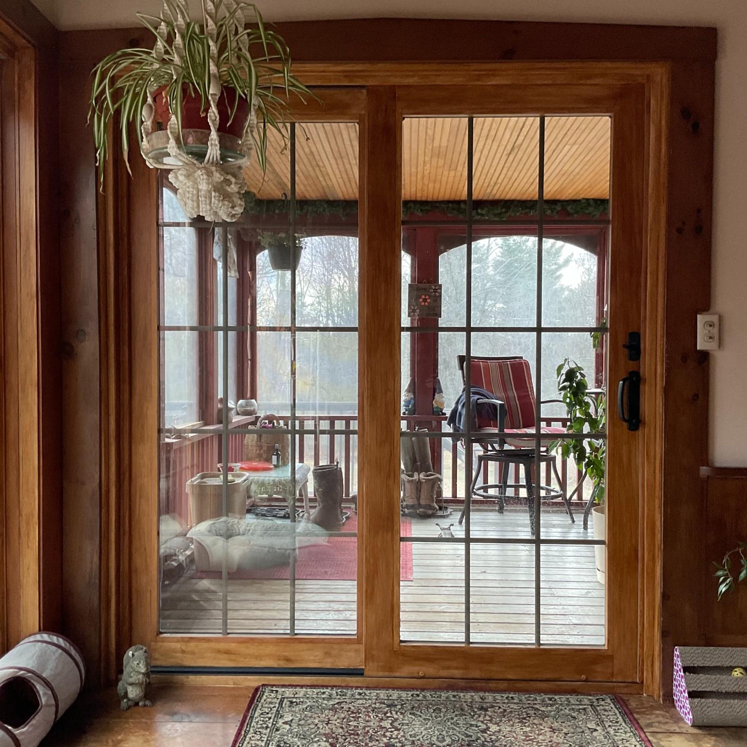 A-series contemporary sliding doors with a custom wood stain. The equal lite grilles add a little bit of traditional styling.