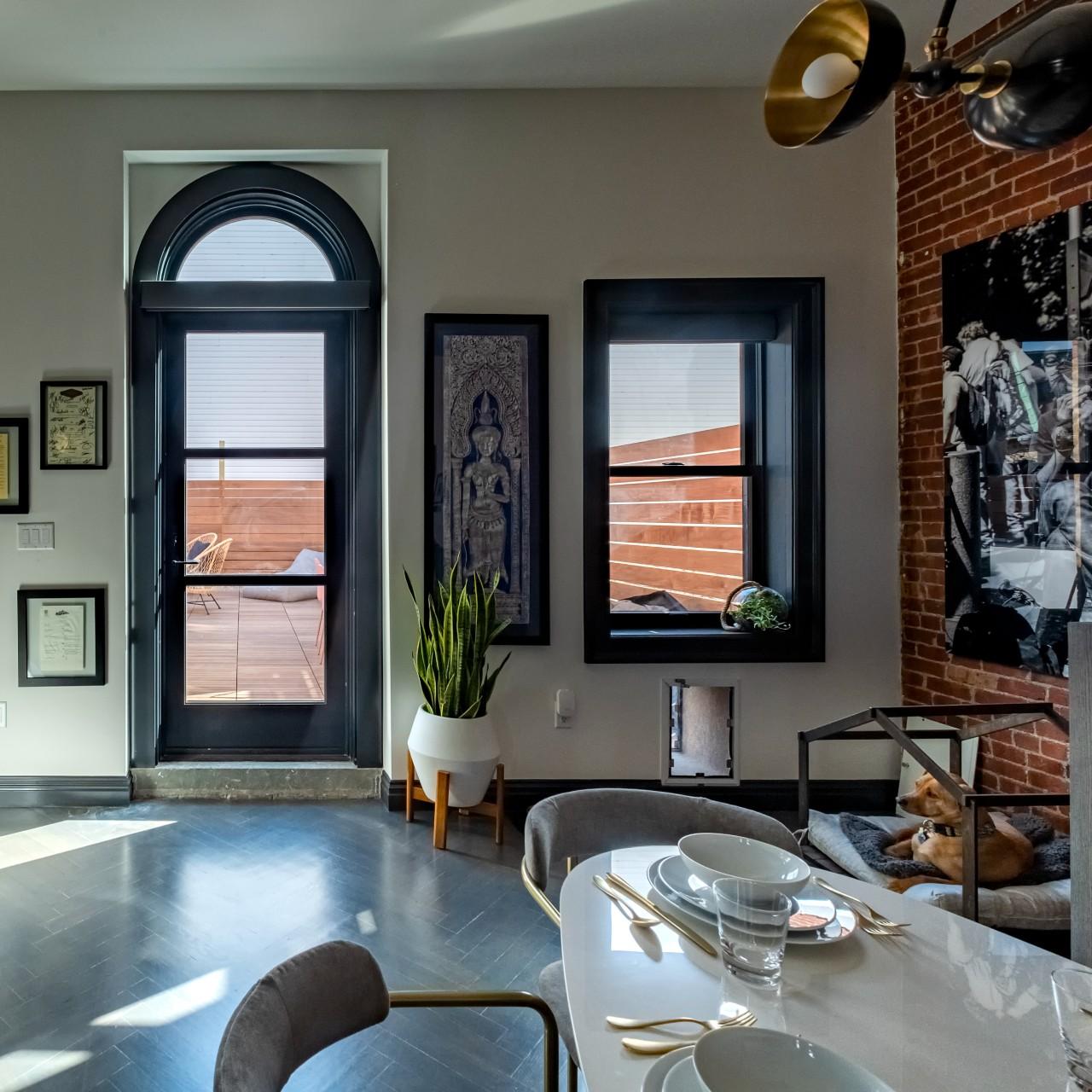 Another view of the kitchen and dining area.
