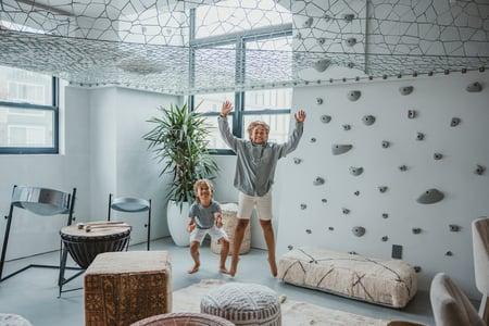 Breegan Jane has two boys. They are in their playroom horsing around by the climbing wall.