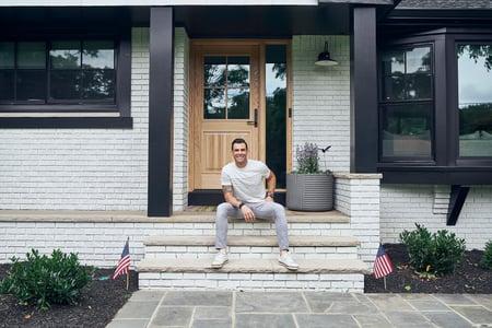 John Colaneri sits outside his house, just chilling.